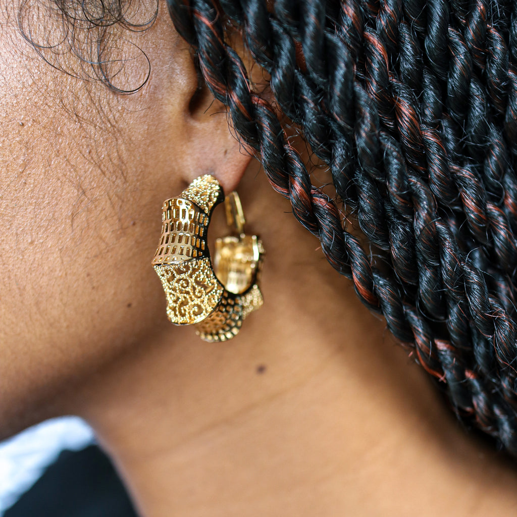 Good Advice Earrings. Gold and brass medium sized earrings. Inspired by African print. Bandele Muse